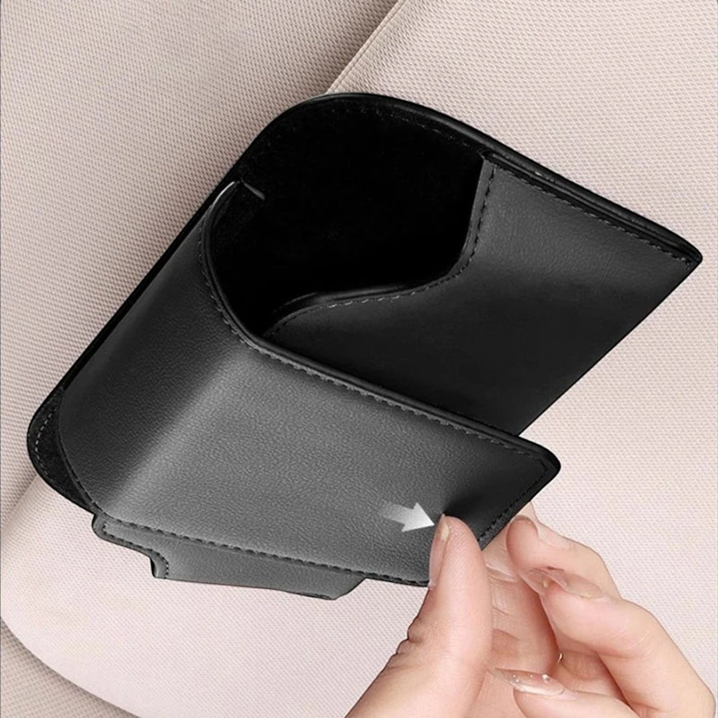 Elevate Automotive black genuine leather sun visor sunglasses holder with magnetic clasp.