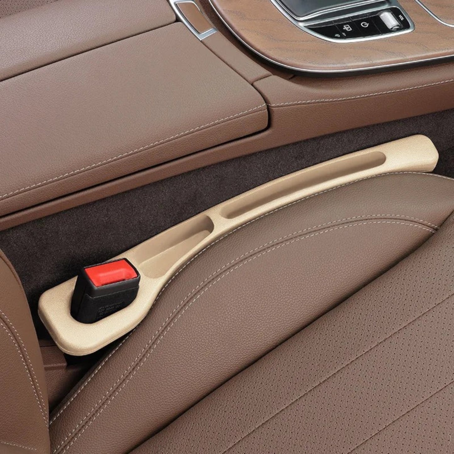 Elevate Automotive beige car seat gap organizer with built-in pockets and a non-slip base.