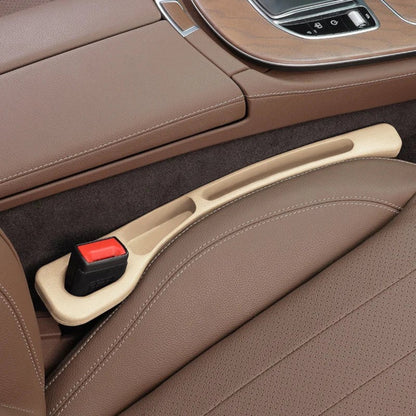 Elevate Automotive beige car seat gap organizer with built-in pockets and a non-slip base.