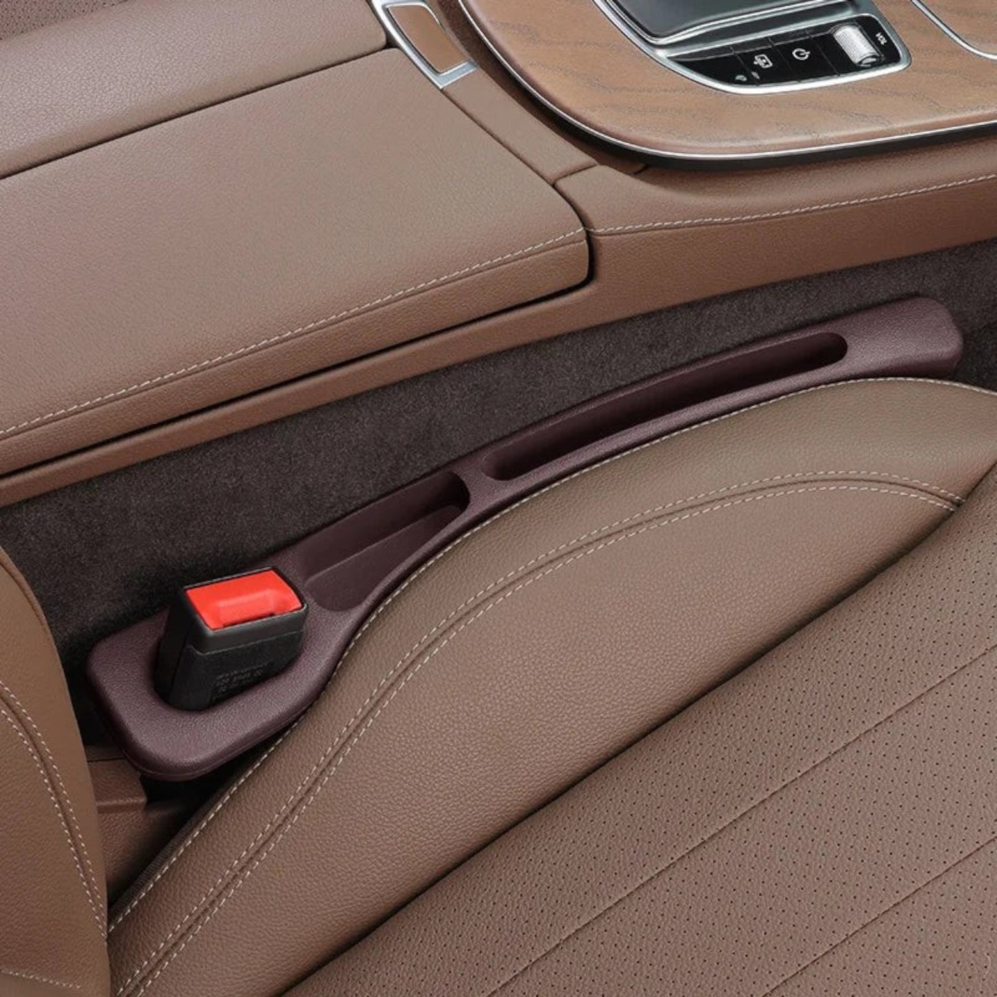 Elevate Automotive car seat gap organizer in dark brown with built-in pockets and a seatbelt buckle.
