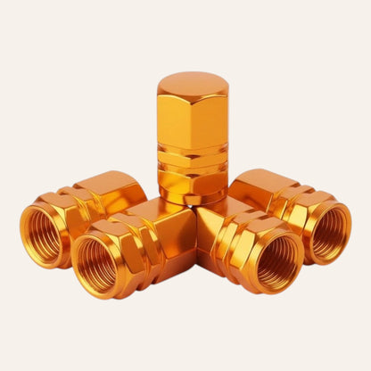 Elevate Automotive gold CNC-machined aluminum tire valve caps with leak-proof seal. Set of 4.