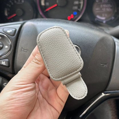 Elevate Automotive grey faux leather car visor clip for sunglasses, cards, and essentials. Features soft lining to protect lenses.