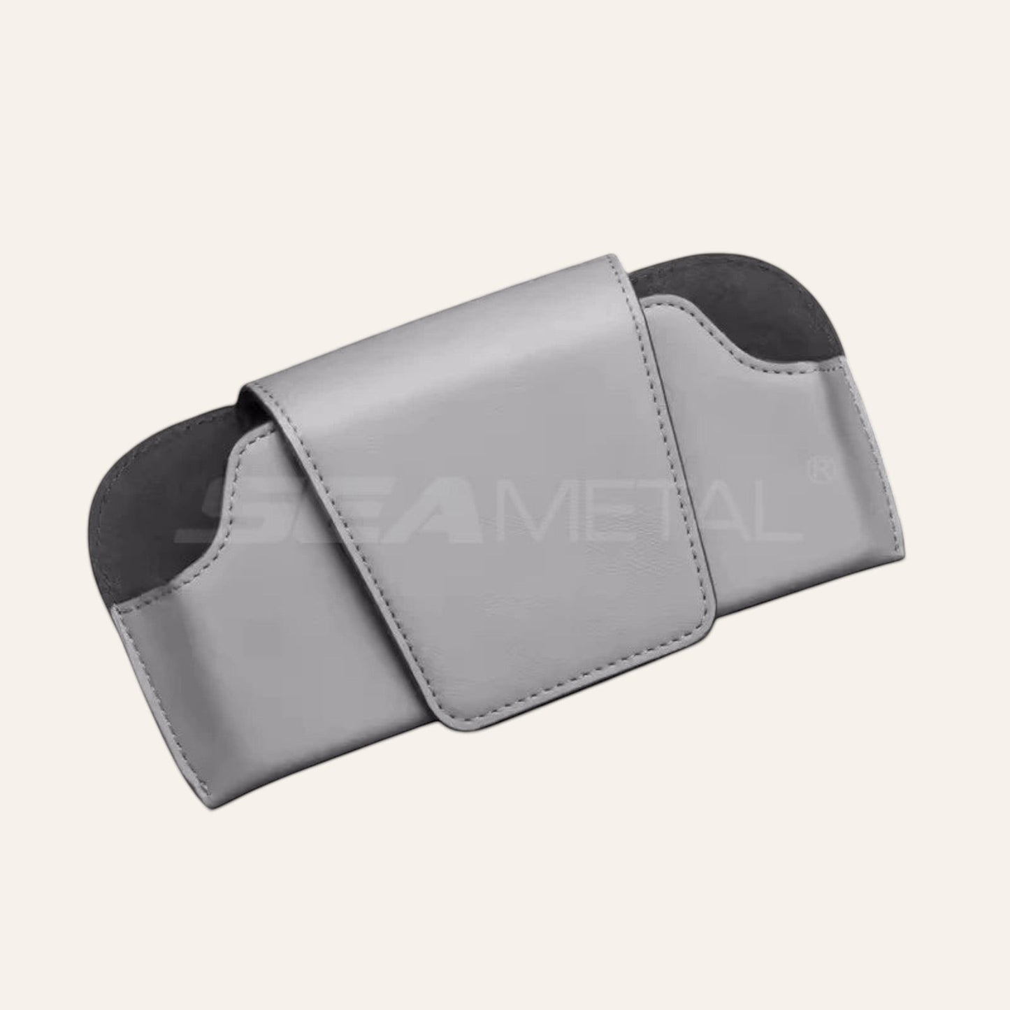 Elevate Automotive grey genuine leather sun visor sunglasses holder with magnetic clasp.