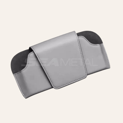 Elevate Automotive grey genuine leather sun visor sunglasses holder with magnetic clasp.