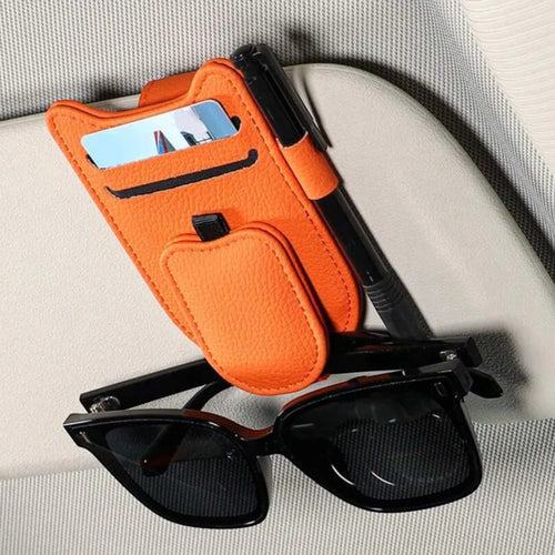 Elevate Automotive orange faux leather car visor organizer holding sunglasses, cards, and a pen.