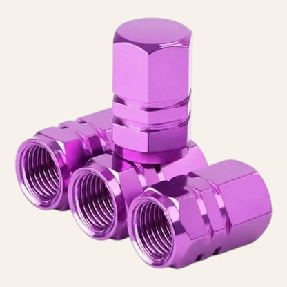 Elevate Automotive purple machined aluminum tire valve caps with leak-proof seal and corrosion-resistant finish.