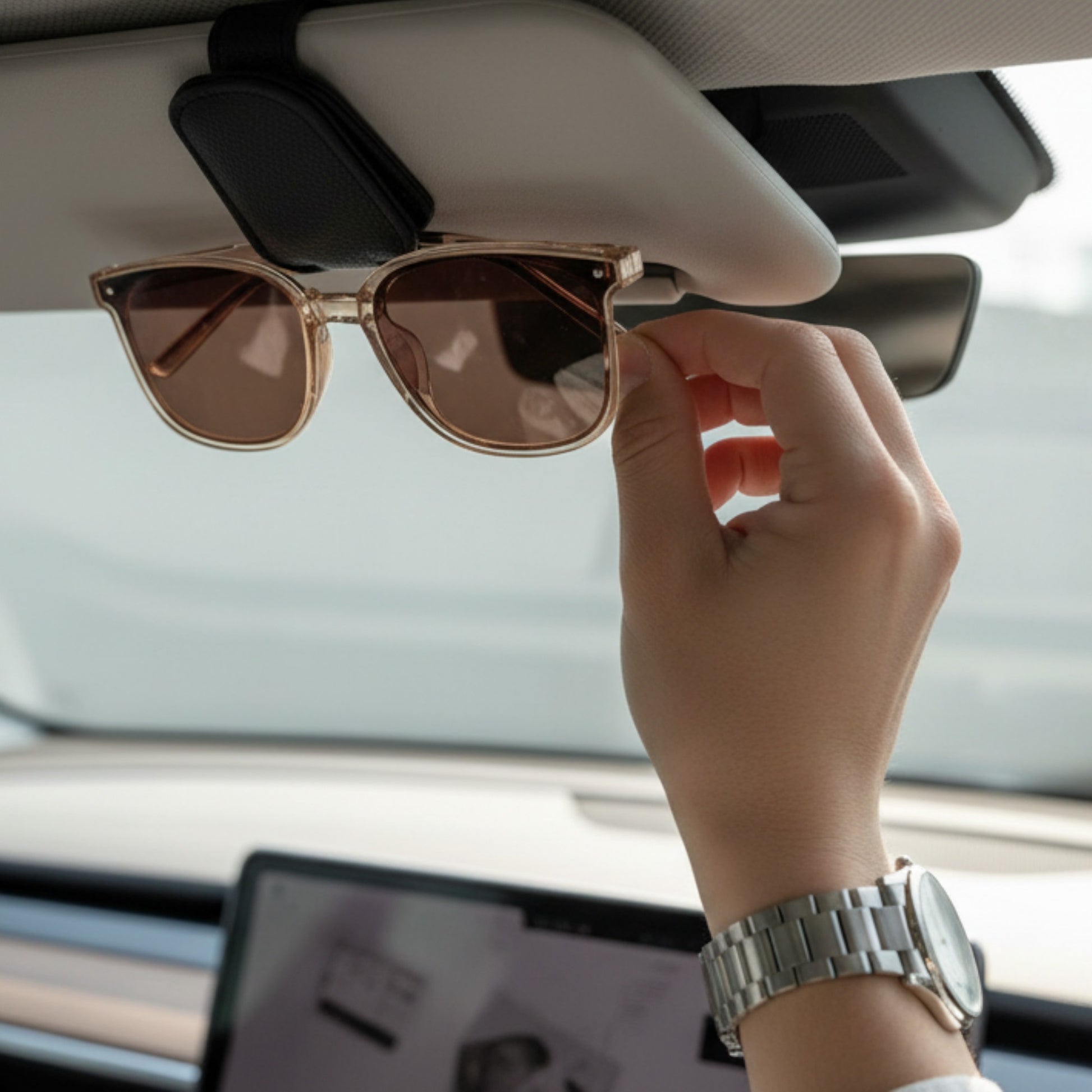 Elevate Automotive car sunglasses visor clip in black, red, grey, and beige. Soft lining protects lenses.