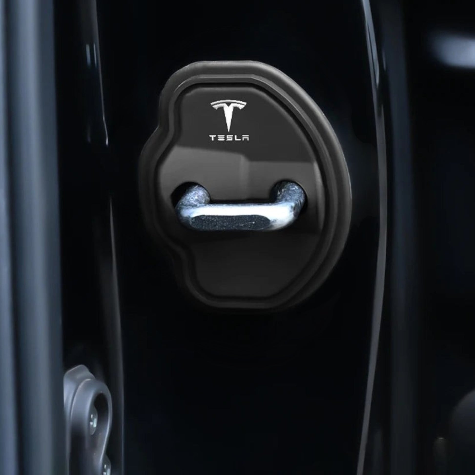 Elevate Automotive black Tesla door lock covers for Model 3/Y, protecting metal and enhancing interior.
