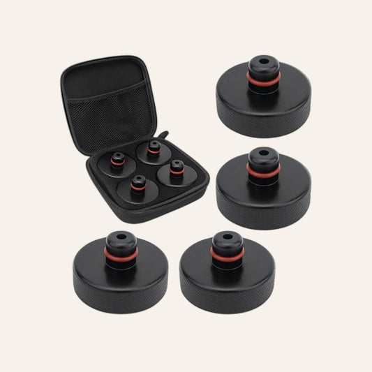 Elevate Automotive black rubber Tesla jack lift pad set with red O-rings, includes storage case.